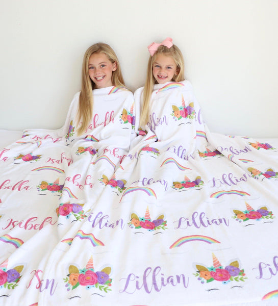 These precious girls love their personalized Unicorn and Rainbow blankets!